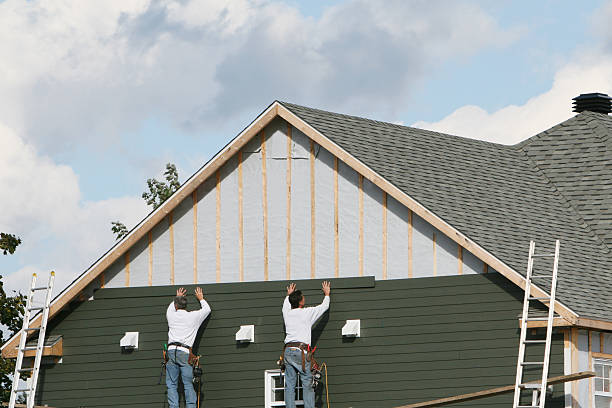 Professional Emergency Siding Repair technician working in Albion, PA